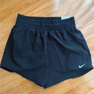 Nike Big Girl’s Black Athletic Shorts with White Swoosh